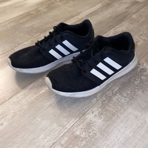 Black and white adidas shoes in size 7.5